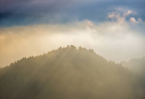 istock Berchtesgadener Land and mount Watzmann silhouette in contra light view, Germany 1253029128