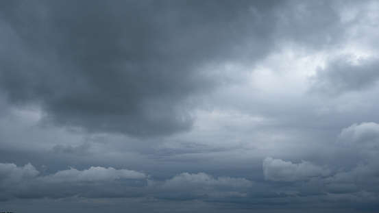 Horizontal storm clouds and light penetrating