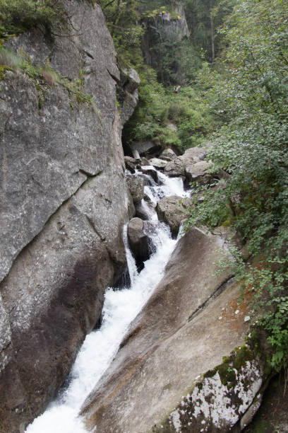 istock Torrent Palobbia, Braone waterfall path, Lombardy, Italy. 1253033153