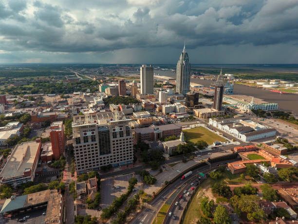 istock Summer storm over downtown Mobile, Alabama 1253037222