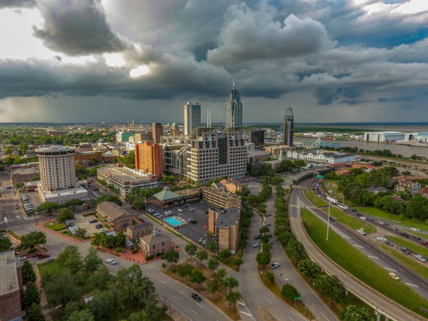 istock Summer storm over downtown Mobile, Alabama 1253037741