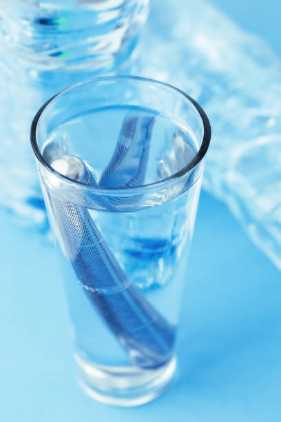 istock Alkaline hydrogen steel filter water stick in water 1253038332