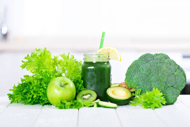 istock Detox smoothie cocktail with green fresh vegetables 1253038443