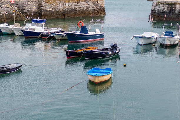 istock Fishing boats in the harbor 1253045601
