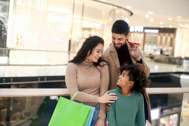 istock Family in a shopping mall 1253045654
