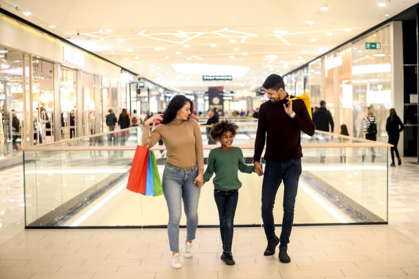 istock Family in a shopping mall 1253045882