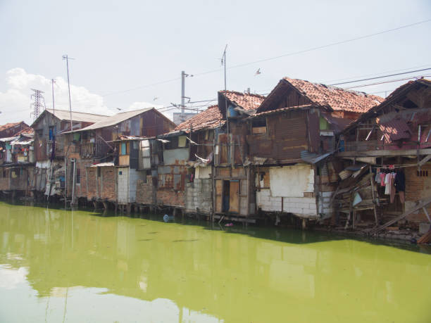 The slums of Jakarta are the capital of Indonesia The slums of Jakarta are the capital of Indonesia jakarta slums stock pictures, royalty-free photos & images
