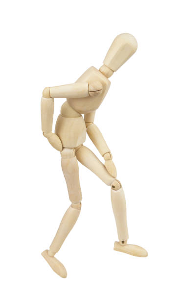 istock Wooden mannequin imitating backache and knee sickness isolated 1253048108