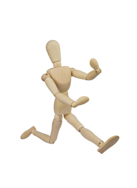 istock Running wooden mannequin isolated 1253048153