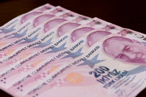 200 Turkish lira ranked , money 200 Turkish liras regularly arranged on the table , money para birimi stock pictures, royalty-free photos & images
