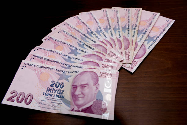 200 Turkish lira ranked , Turkish banknotes 200 Turkish liras regularly arranged on the table , Turkish banknotes para birimi stock pictures, royalty-free photos & images