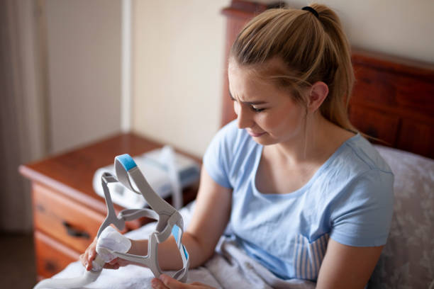Using cpap for the first time, sleep apnea stock photo