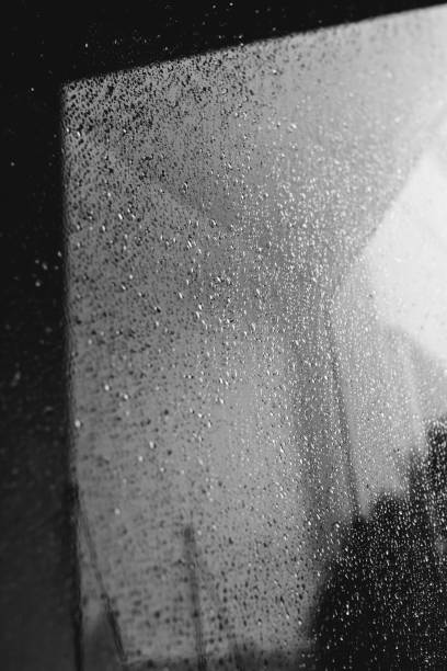 istock Raindrops on window glass,condensation on the window,natural background 1253054171