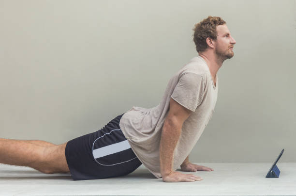 istock Upward Facing Dog pose to Relieve Back Pain 1253057796