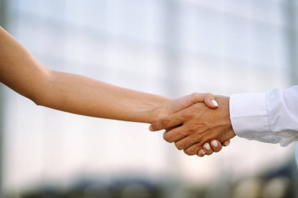 istock Handshake of business partners 1253058940