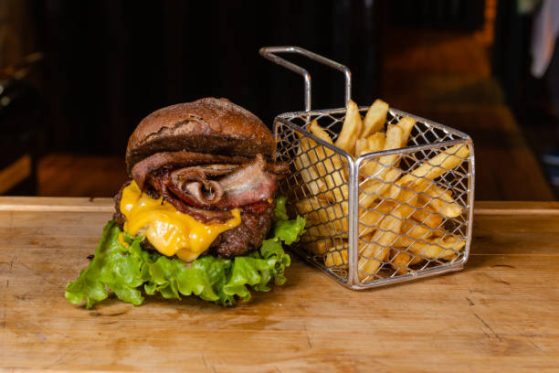 istock burger on a plate with snack bar of background 1253062017