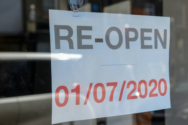 istock Re-Open sign on shop window with date 01/07/2020 1253064378
