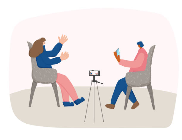 People sitting in the chair. Vector person. Interview concept. Two bloggers recording a content. Young persons sitting in the chair and having a conversationon camera. Man asking a questions and woman answering. Vector flat illustration. interview camera stock illustrations