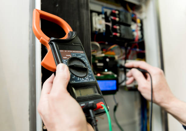 istock The man is repairing the switchboard voltage with automatic switches. 1253068433
