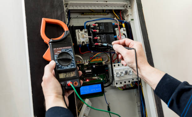 istock The man is repairing the switchboard voltage with automatic switches. 1253068812