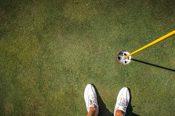 istock Shoes on Golf Green 1253072847
