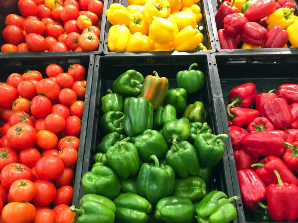 istock Supermarket vegetables showcase with bell pepper and tomato. 1253078549