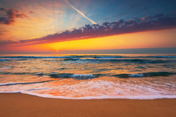 istock Beautiful sunset over the tropical sea 1253078717