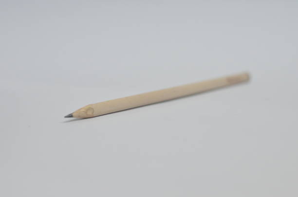 istock Wooden Pencil isolated on white background 1253080096