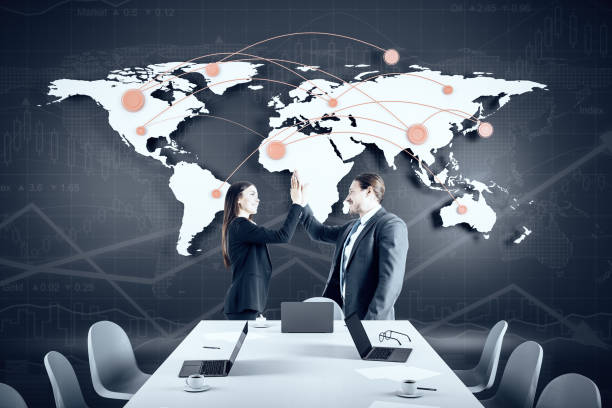 istock Happy two businesspeople in office 1253082435