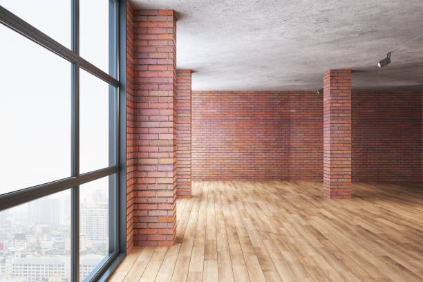 istock Modern red brick room with column and panoramic city view. 1253083522
