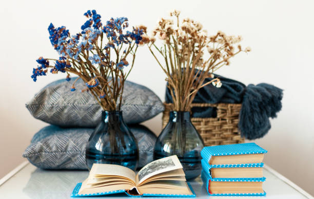 istock Cozy home interior decor: stack of books 1253086912