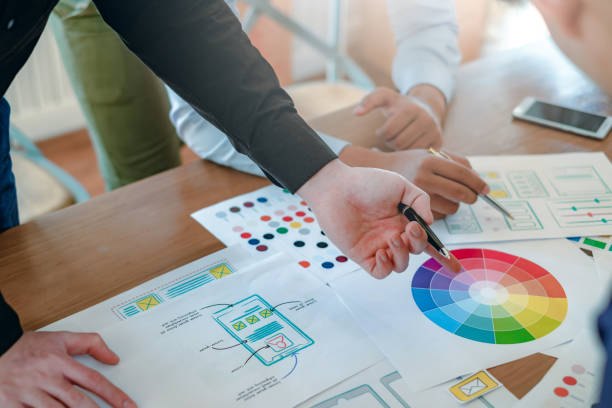 istock Creative web designers and applications work together in the office. 1253087320