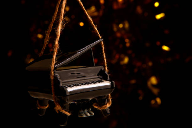 istock image of black piano rope dark background 1253088388