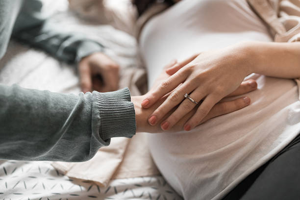 istock Trying to feel the baby 1253088437