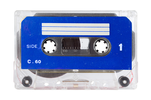 Close up of a vintage music audio tape on white background