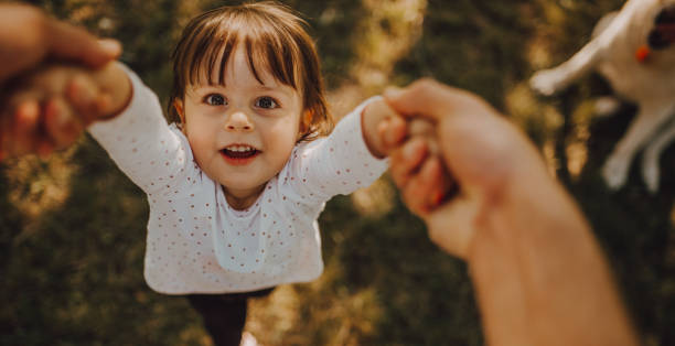 istock The father holds the daughter 1253090453