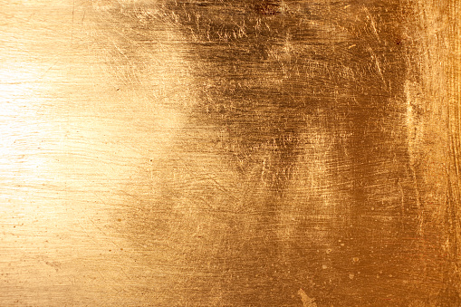 Gold painted texture on wall
