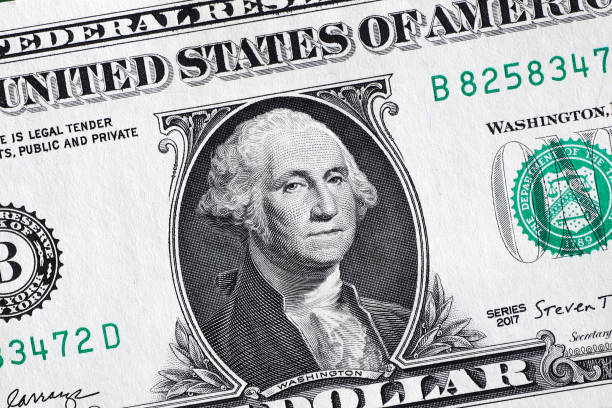 istock American dollar bill in 1 dollar close-up. 1253094402