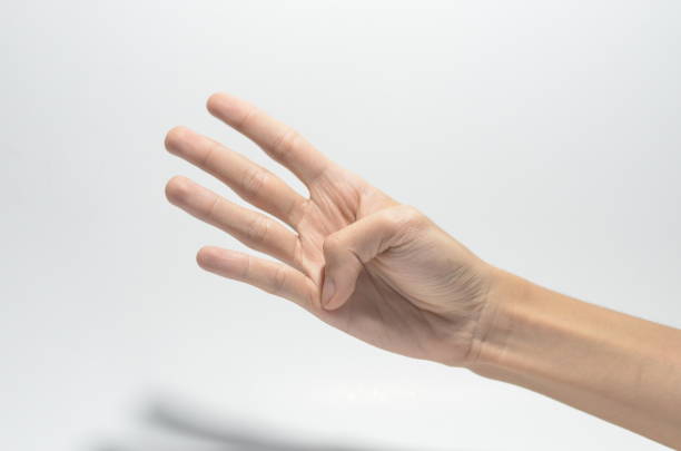 istock hands finger number 4 on isolated white background 1253094469