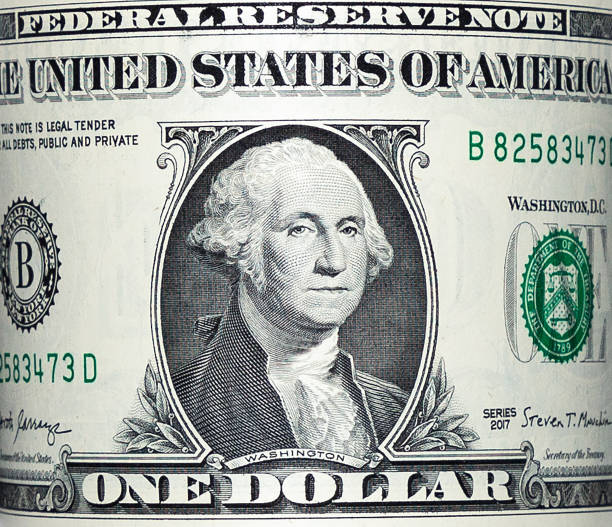 istock American dollar bill in 1 dollar close-up. 1253094749