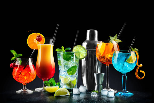 Set of various cocktails with on black background Set of various cocktails with shaker on black background cocktail shaker photos stock pictures, royalty-free photos & images