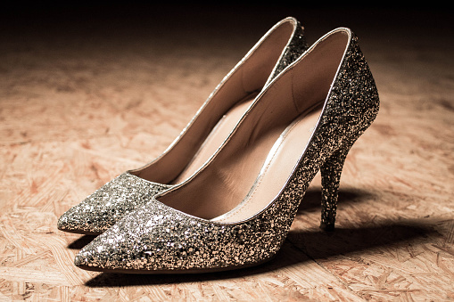 glitter high heels woman shoes shiny fashion. High quality photo