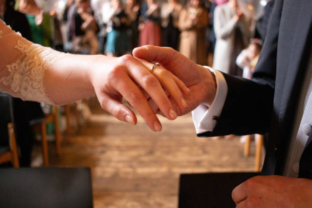 istock wedding ring getting married marriage ceremony finger 1253096173