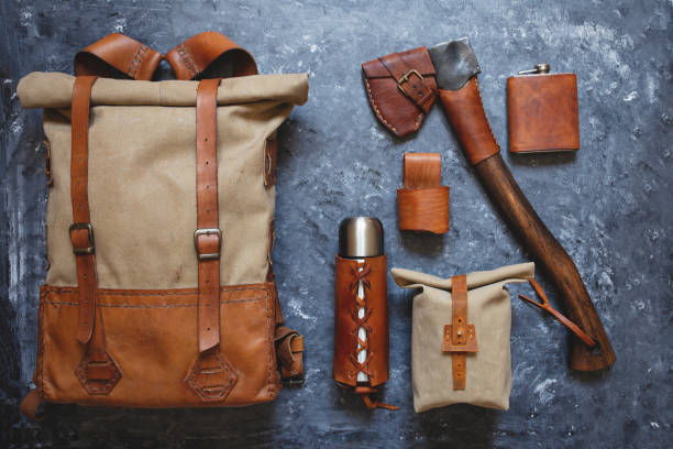 istock vintage backpack and camping equipment 1253098699