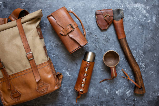 istock vintage backpack and camping equipment 1253098707