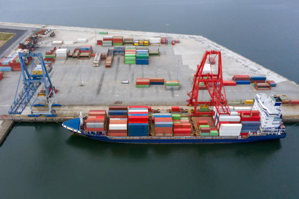 istock aerial view of an industrial cargo ship with containers for loading at a seaport 1253099167