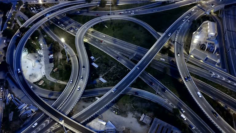 View  of highway and overpass  at night