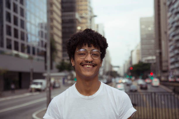 istock Afro young man from the city portrait 1253100640