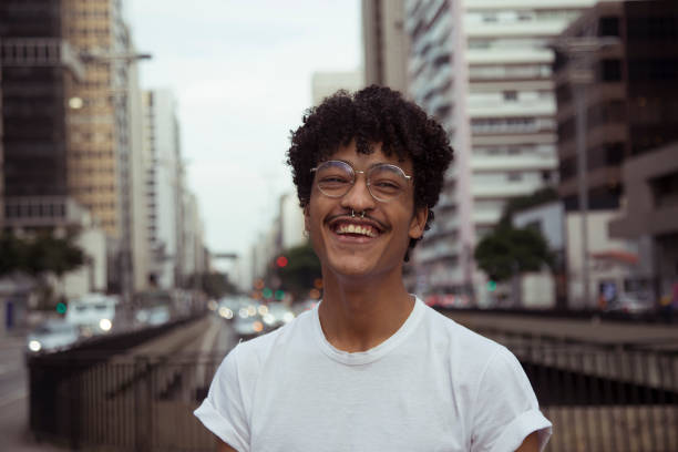 istock Afro young man from the city portrait 1253100680