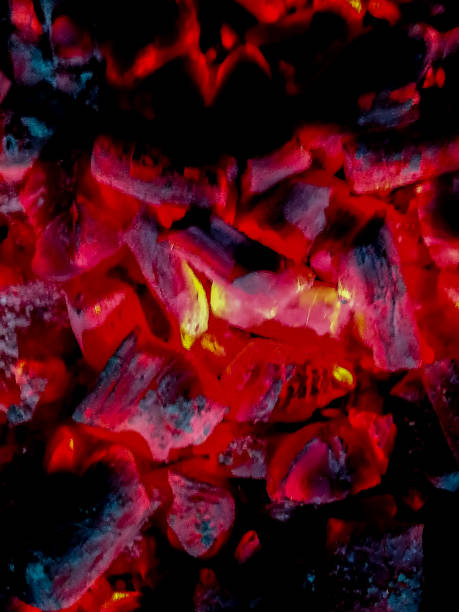 istock Incandescent coals in reddish, orange and yellow tones 1253101922